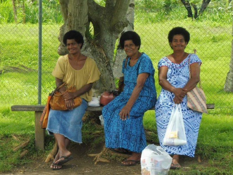 Women Sitting Local women sitting on a park bench.
