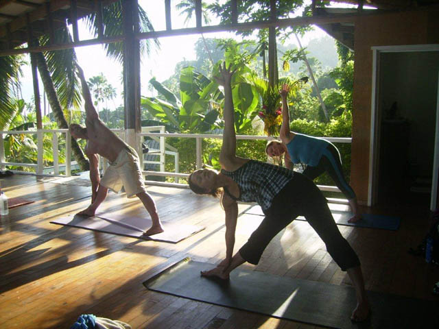 Yoga students practice on the deck at Daku Resort, Savusavu.